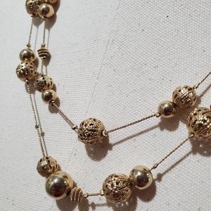 Dual strand gold tone necklace